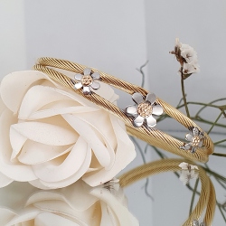PULSERA ACERO Y ORO MARGARITAS
