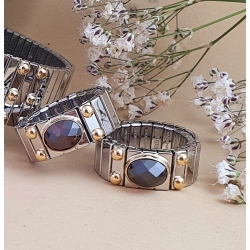 SORTIJA ACERO Y ORO ONIX FACETADO