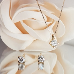 COLGANTE ORO BRILLANTE EN GARRAS 0.20CT