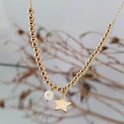 GARGANTILLA ORO 18 KT. PERLA CULTIVADA Y ESTRELLA