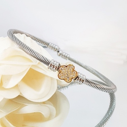 PULSERA ACERO Y ORO FLOR