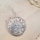 MEDALLA VIRGEN DEL CARMEN PLATA CALADA 27 MM.