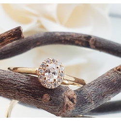 ANILLO ORO 18 KT. ROSETA OVAL DIAMANTES 0.20